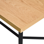 Close-up of April dining set table corner with wood finish.