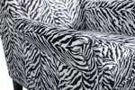 Bliss Chair upholstered in zebra velvet from the Monochrome Collection