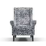 Bliss Wing Chair upholstered in zebra velvet with dark timber legs.
