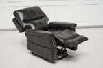 ComfortRise lift chair in black faux leather with lifting mechanism