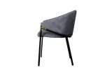 Side view of Manhattan Chair in Charcoal with velvet fabric and black steel legs.