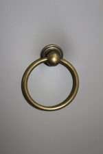 Elena Chair bronze ring pull detail on grey faux leather