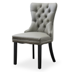 Elena Chair in grey faux leather with tufted back and bronze accents