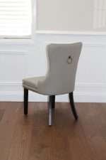 Back view of the elegant Elena chair in grey faux leather with ring pull