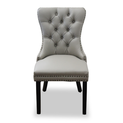 Front view of Elena Chair in grey faux leather with tufted back