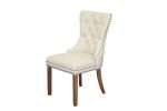 Elena chair in cream faux leather with tufted back and wood legs