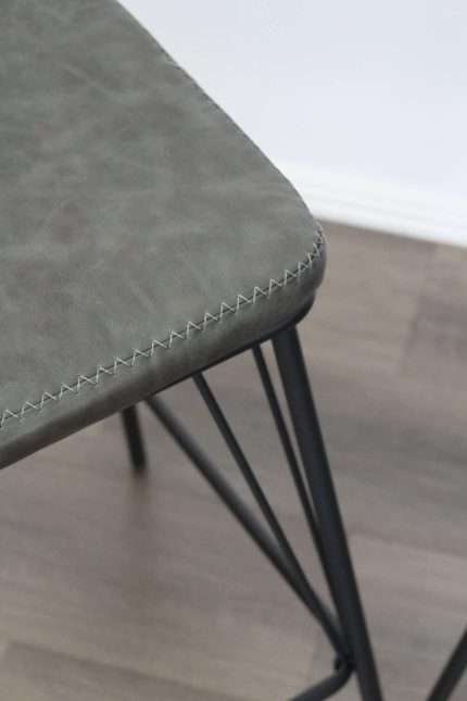 Close-up of grey Bayou Stool with vintage leather look PU upholstery