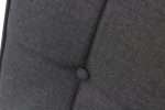 Close-up of Lodge Dining Chair Black fabric and button detail