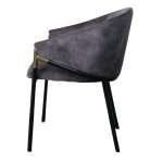 Side view of Manhattan Chair in charcoal with velvet fabric and steel legs.