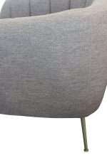 Close-up of Monet Accent Chair in Fiesta Mink with sleek bronze legs.