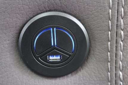 Close-up of USB power button on Otto Power Motion recliner
