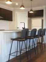 Rivetto Bar Stool in Vintage Tan with faux leather in kitchen