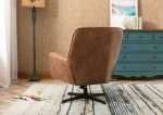 Wentworth Swivel Chair with tan faux leather upholstery in a modern room