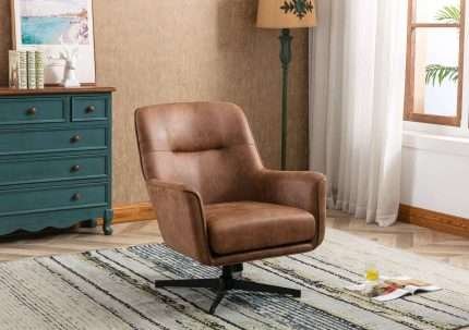 Wentworth swivel chair in tan faux leather upholstery in living room.